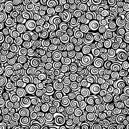 This intricate black and white design features a chaotic yet rhythmic expanse of tightly interlocking spirals, resembling a dense bed of stylized roses or swirling storm clouds