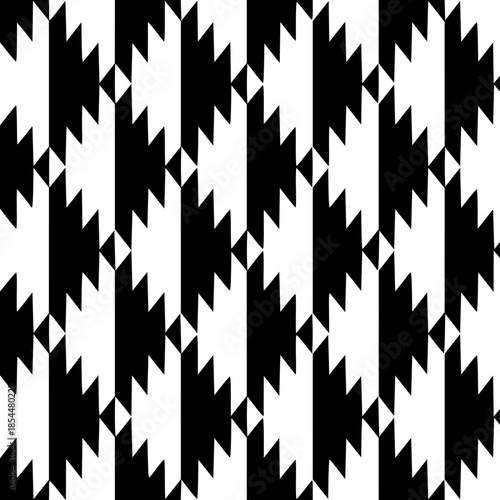 Abstract Geometric Seamless Pattern with Tribal Diamond Shapes in Black and White.