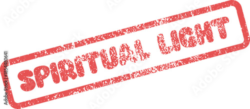 Distressed red rubber stamp impression showing the motivational words Spiritual Light on a clean surface