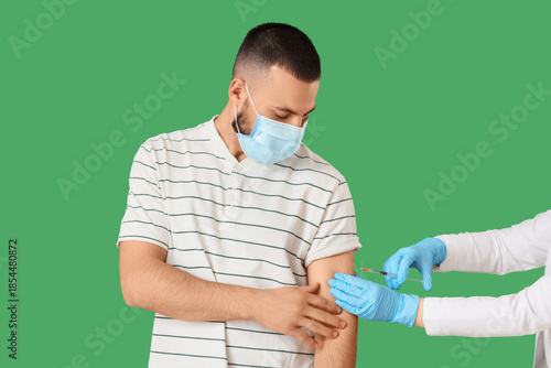 Young man in medical mask r...