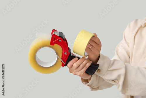 Young woman with adhesive t...