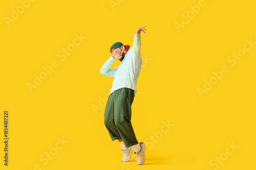 Young man dancing hip-hop o...