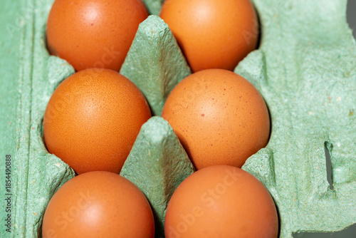 packaging with fresh whole chicken eggs