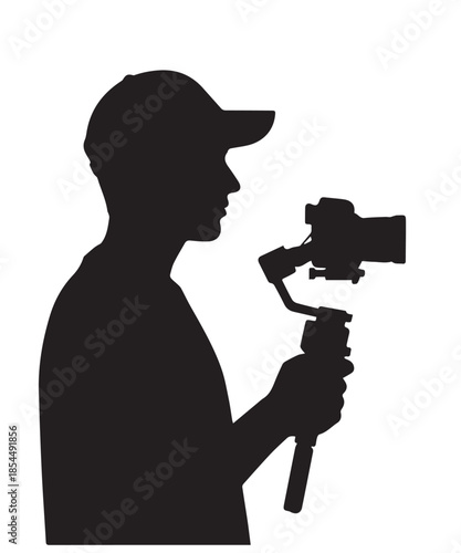 Silhouette of a videographer holding a camera on a gimbal stabilizer