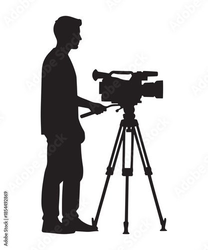 Silhouette of a cameraman operating a professional video camera on a tripod