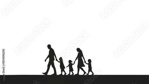 Silhouette of a family walking together holding hands.