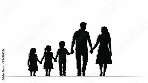 Silhouette of a family holding hands walking together.