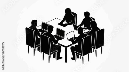 Silhouettes of people working around a table with laptops.