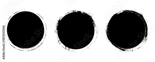 A collection of black grunge circular shapes on a white background, featuring paintbrush style stamps. Includes vector brush circles and distressed round designs. ink brush ellipse circle shape vector