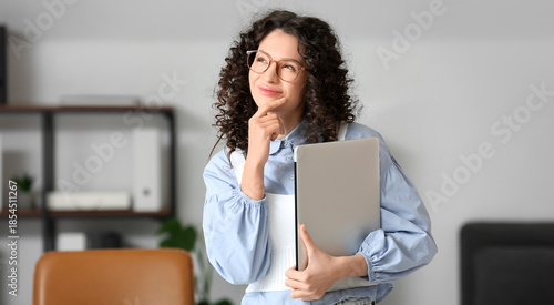Thoughtful businesswoman wi...