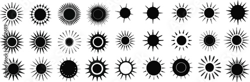 A collection of black and white suns with varying sizes and shapes