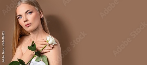 Beautiful woman holding whi...