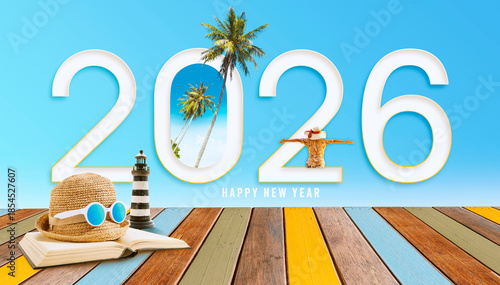 Happy new year 2026.Tourism has begun. A woman is welcoming the new year at the seaside. planning for new destination.