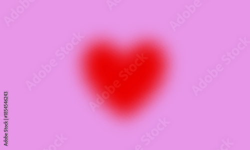 Soft blurred red heart on a pink background creating a romantic dreamy atmosphere. Abstract love and Valentine’s Day background ideal for greeting cards social media banners invitations posters.