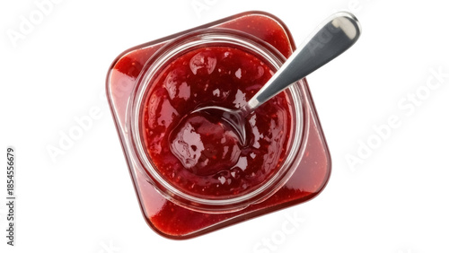 Strawberry jam in a glass jar with spoon isolated PNG, homemade fruit preserve on transparent background for breakfast and dessert