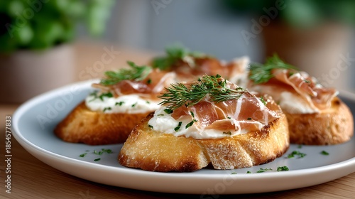 Gourmet bruschetta with prosciutto ham and cream cheese garnished with fresh dill, elegant Italian appetizer on plate