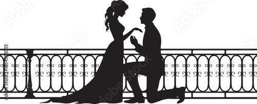 Man proposing to woman on balcony silhouette couple