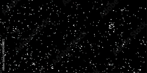 falling snow flakes. black and white glitter texture abstract background.
