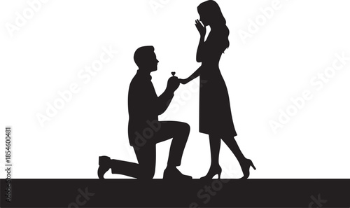Man proposing with ring to surprised woman silhouette