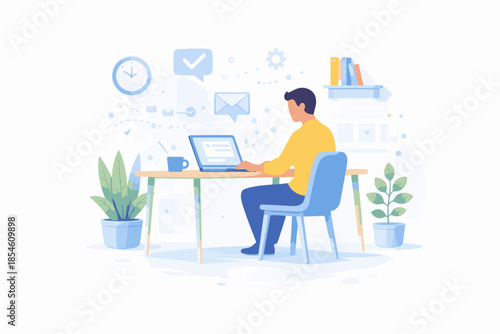 A person working diligently at a desk, with a laptop, plants, and other work elements around him. The person is focused on the computer