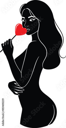 Sensual woman holding heart lollipop in playful pose