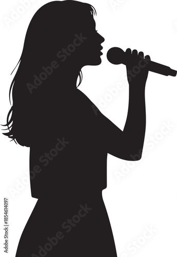Silhouette of a young woman singing into a microphone on stage