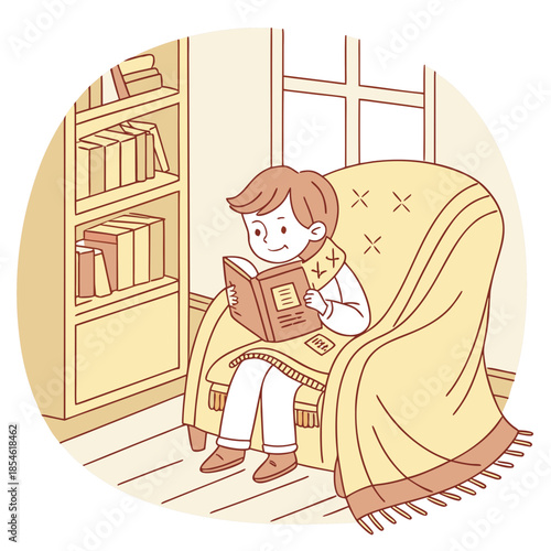 Young boy reading a book while sitting in cozy armchair at home  