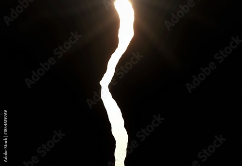Dramatic Display of Natural Phenomenon Capturing a Breathtaking Vertical Lightning Bolt Against a Dark Night Sky