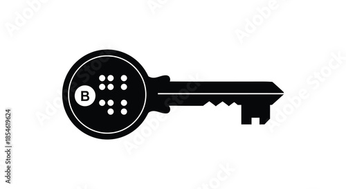 A striking black key design with a circular head and detailed cuts a bold silhouette