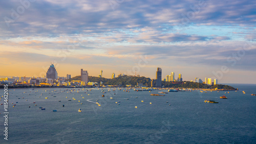Pattaya city from high angle with beach and buildings in morning time. It is a landmark and popular tourist destination.