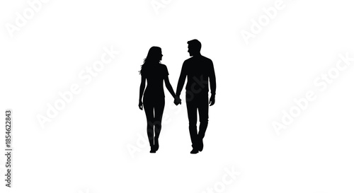 A couple walking hand in hand viewed from the front presenting a striking silhouette
