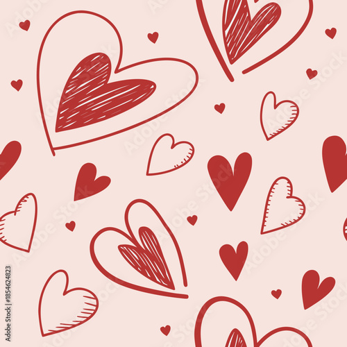A whimsical pattern of hand-drawn red and pink hearts in various sizes and styles—some filled, some outlined, some shaded—scattered playfully on a soft blush background. Perfect for Valentine's Day.