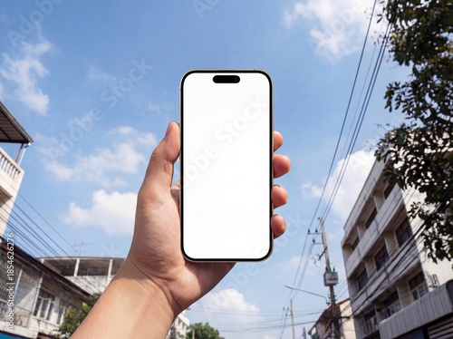 Smartphone Mockup Hold in Hand Against Blue Sky Outdoors