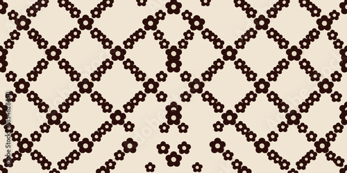 Pattern of interconnected circles forming a diamond shape on a beige background