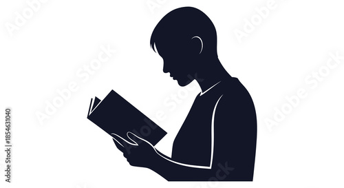 A person engrossed in reading a book captured in a striking black and white silhouette
