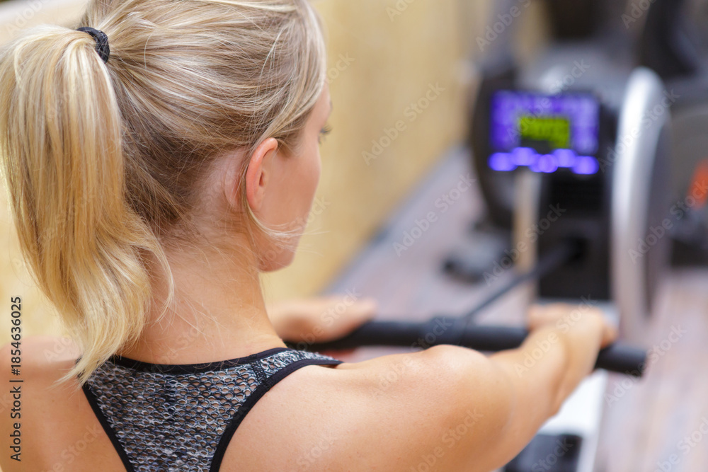 Fototapeta premium a woman on rowing machine