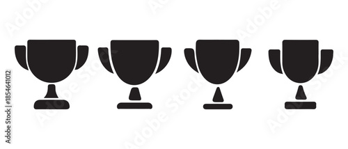 A row of four black trophy silhouettes highlighting achievement and winning concepts.