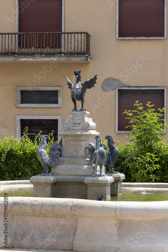 Baroque Fontana dei Galli (Fountain of the Roosters), bronze roosters and dragon, Loreto, Italy