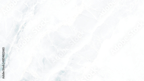 Marble background.White stone texture with gray shadow.Panoramic format.