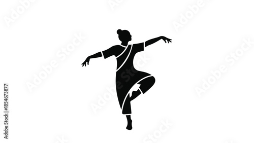 Graceful silhouette of a dancer in traditional attire performing an expressive pose.