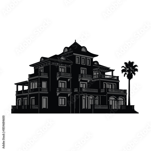 Silhouette of a grand building with a palm tree