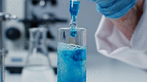 Science lab experiment with dropper beaker