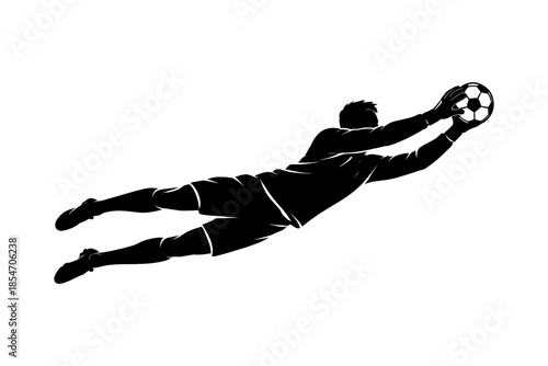 Soccer goalkeeper silhouette diving to catch the ball in mid-air