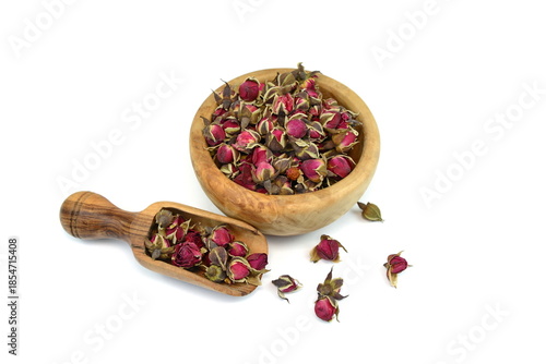 Dried Rose Buds. Dried red or pink rose buds. Natural dried rose tea isolated on white background  
