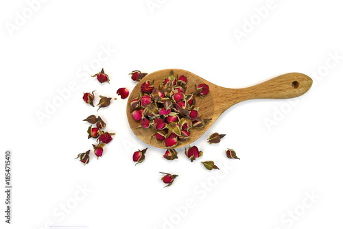 Dried Rose Buds. Dried red or pink rose buds. Natural dried rose tea isolated on white background  