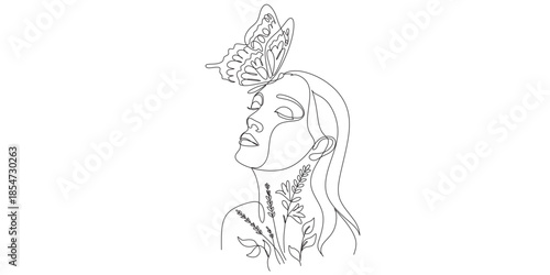 Elegant woman with flowers in hair and on neck, serene expression