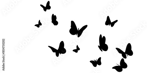 Black butterflies flying in formation on white background