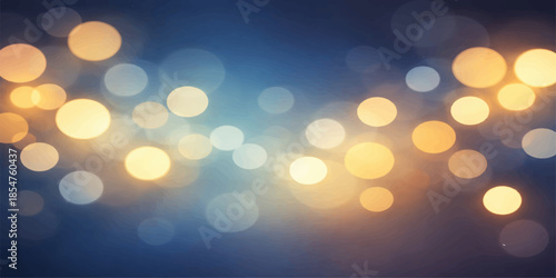 Shiny abstract bokeh background with glowing defocused blue and gold Christmas lights creating a bright glittery holiday pattern for a decorative blurred wallpaper backdrop