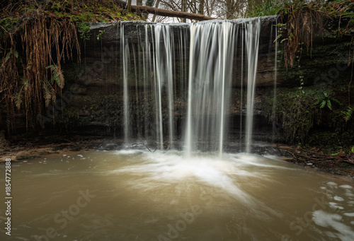 High weald woodland waterfall near Crowhurst east Sussex south east England UK