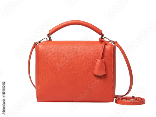 Bright red leather handbag with detachable strap isolated on transparent background